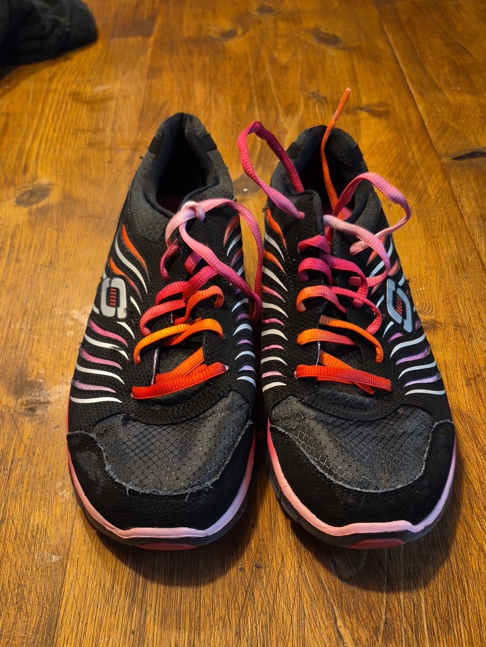 Skechers Women's Black Athletic Shoes with Pink and Orange Accents